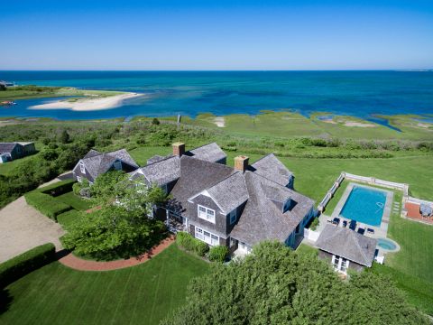Aerial View of Gorgeous Estate Waterfront Home with Heated Pool